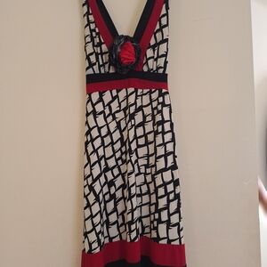 Lipstick Boutique Black and White Backless Dress with Red Details